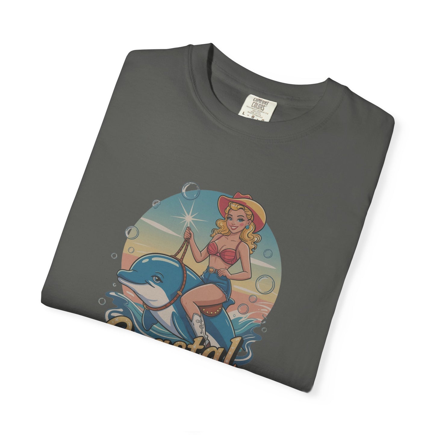 Folded t-shirt with a graphic of a woman and dolphin on a white background