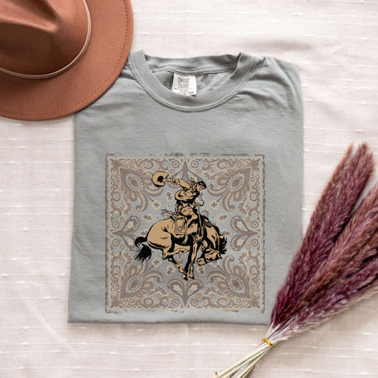 Bandana bronco cowgirl graphic tee laid flat in color grey