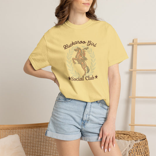 Buckaroo Girl Social Club tee with vintage cowgirl and horse graphic on model in color butter