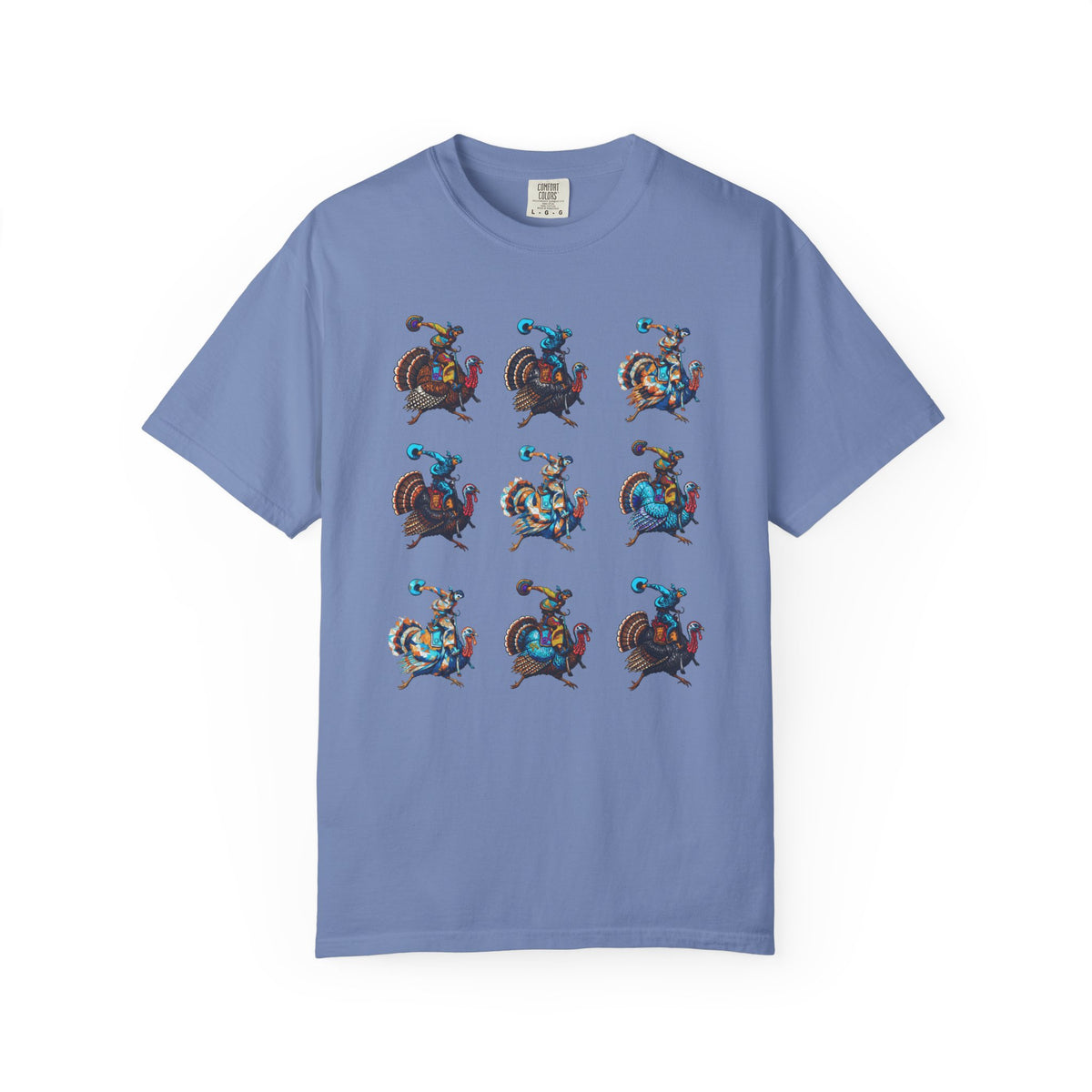 A light blue crewneck t-shirt featuring a 3x3 grid of colorful pixel-art cowboy and steer characters on the front, displayed against a clean white background.