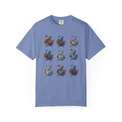 A light blue crewneck t-shirt featuring a 3x3 grid of colorful pixel-art cowboy and steer characters on the front, displayed against a clean white background.