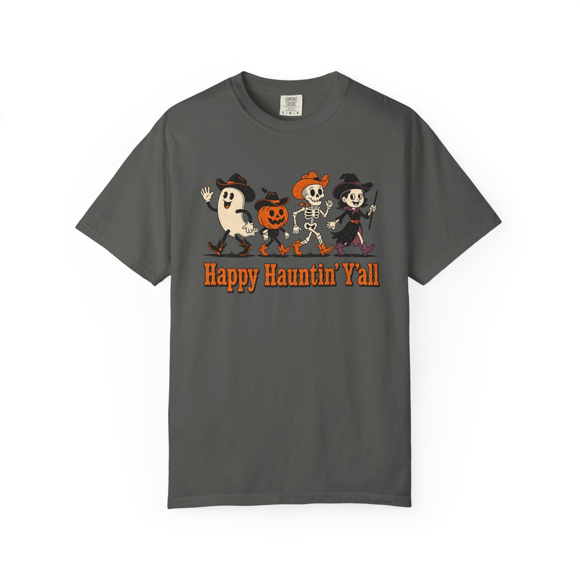 A pepper crewneck t-shirt featuring a cartoon graphic of a ghost, a pumpkin, and a skeleton dancing, with the text 'Happy Haunting' Y'all' printed below in orange.