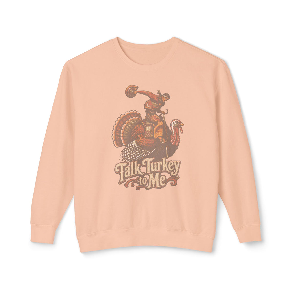 A peach-colored crewneck sweatshirt featuring a vintage-style graphic of a turkey riding a horse with the text 'Talk Turkey to Me' printed below, displayed against a clean white background.