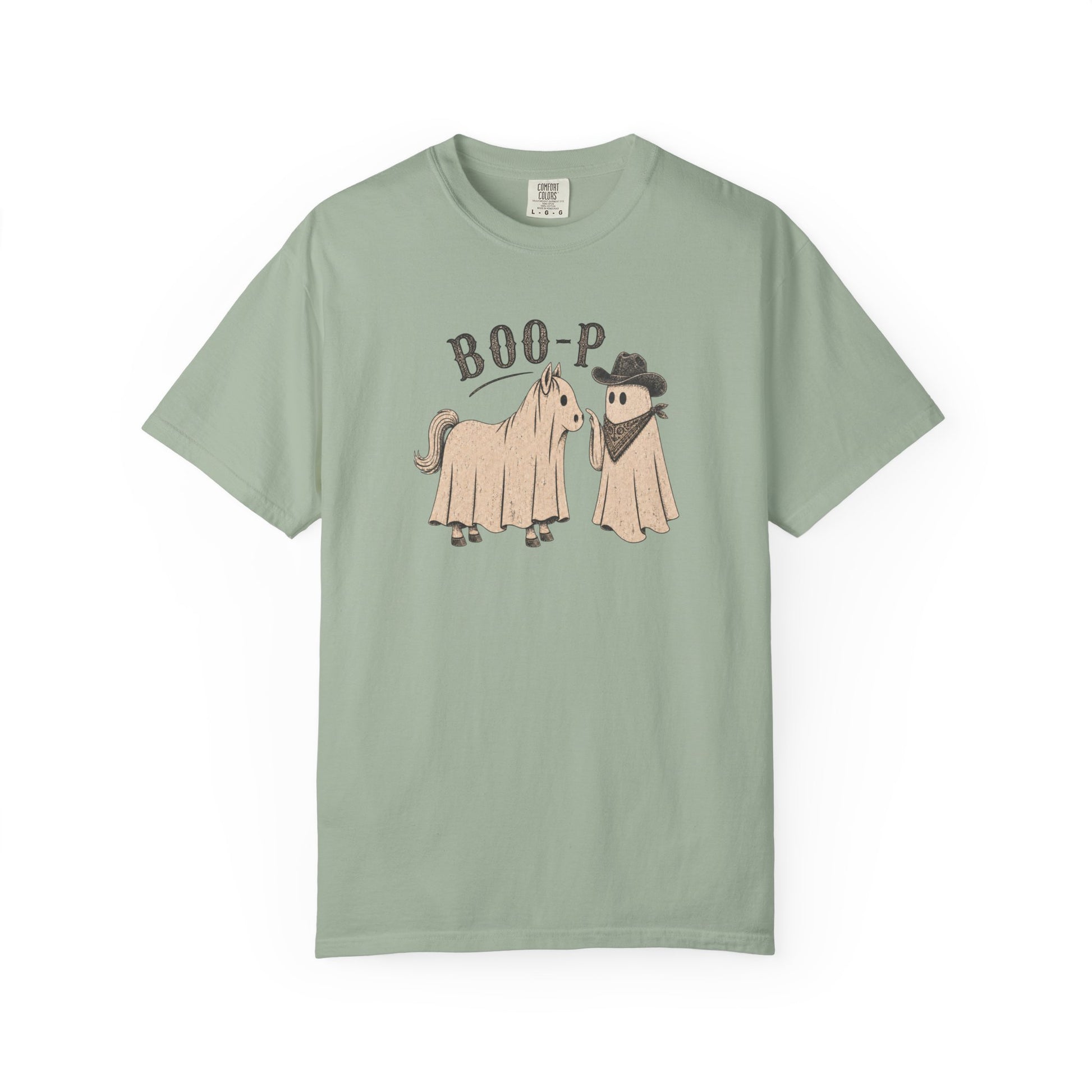 Blue t-shirt with graphic of horse ghost and cowboy ghost and text on a white background