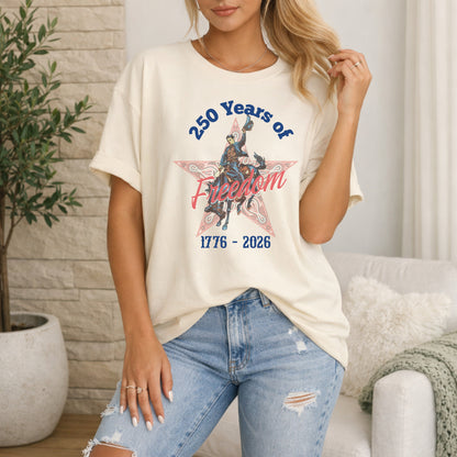 250 Years of Freedom tee with 1776 to 2026 patriotic graphic on model in ivory