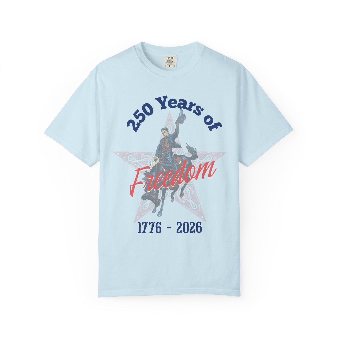 250 Years of Freedom tee with 1776 to 2026 patriotic graphic tee laying flat on white background in color chambray