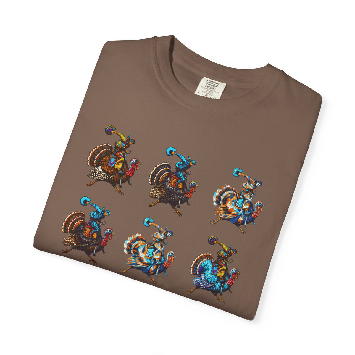 A brown folded t-shirt with a graphic of a dog and the text 'SELECTIVELY OBEDIENT COMES WHEN CALLED SOMETIMES' on a white background.