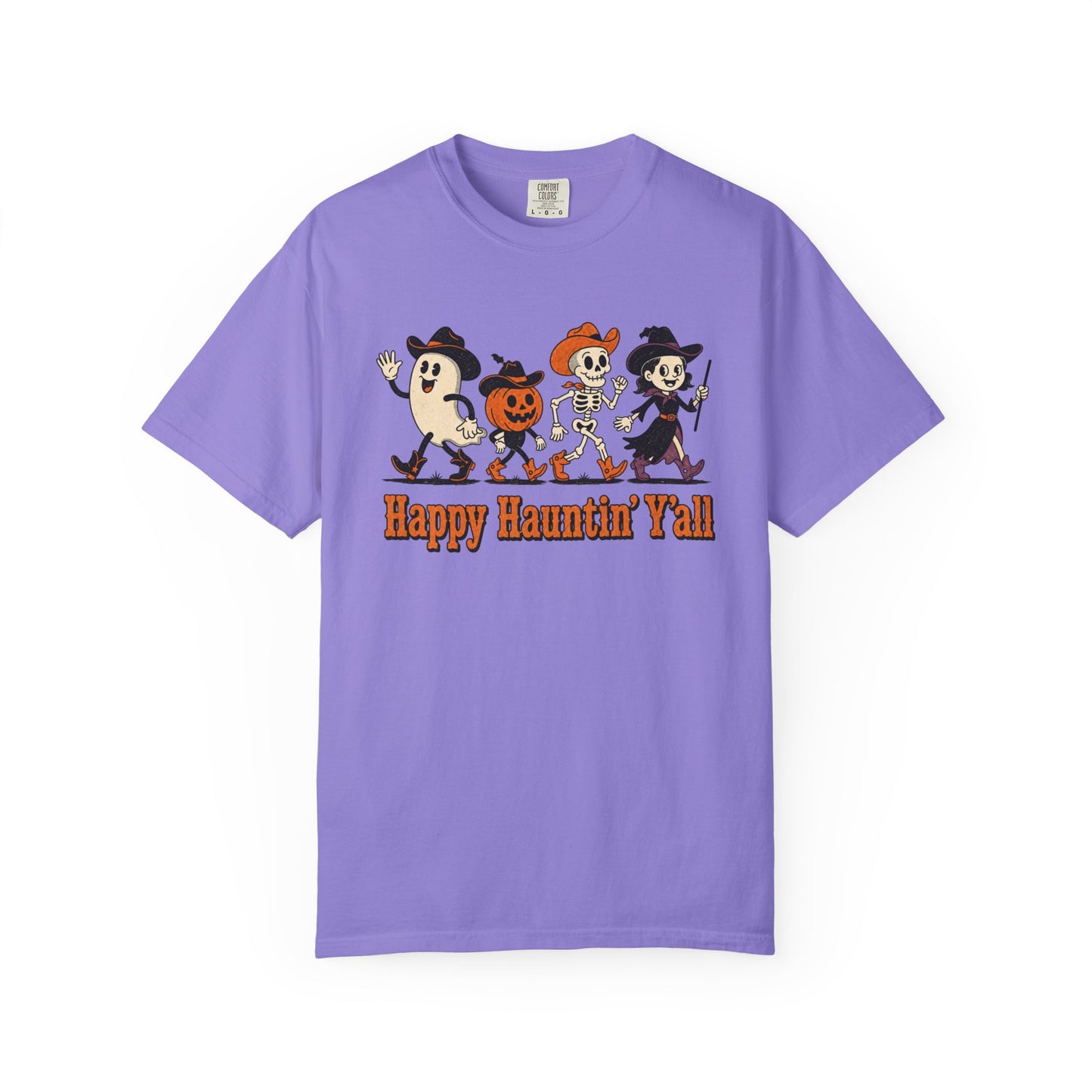 A purple short-sleeve crewneck t-shirt featuring a cartoon graphic of four Halloween characters and the text 'Happy Haunthin' Y'all' printed on the chest, displayed against a plain white background.