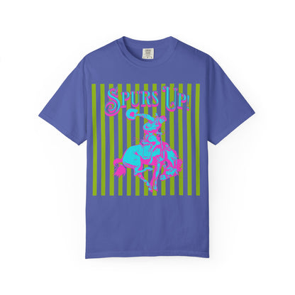Blue t-shirt with graphic design of a cowboy on a horse and 'Spurs Up' text on a white background