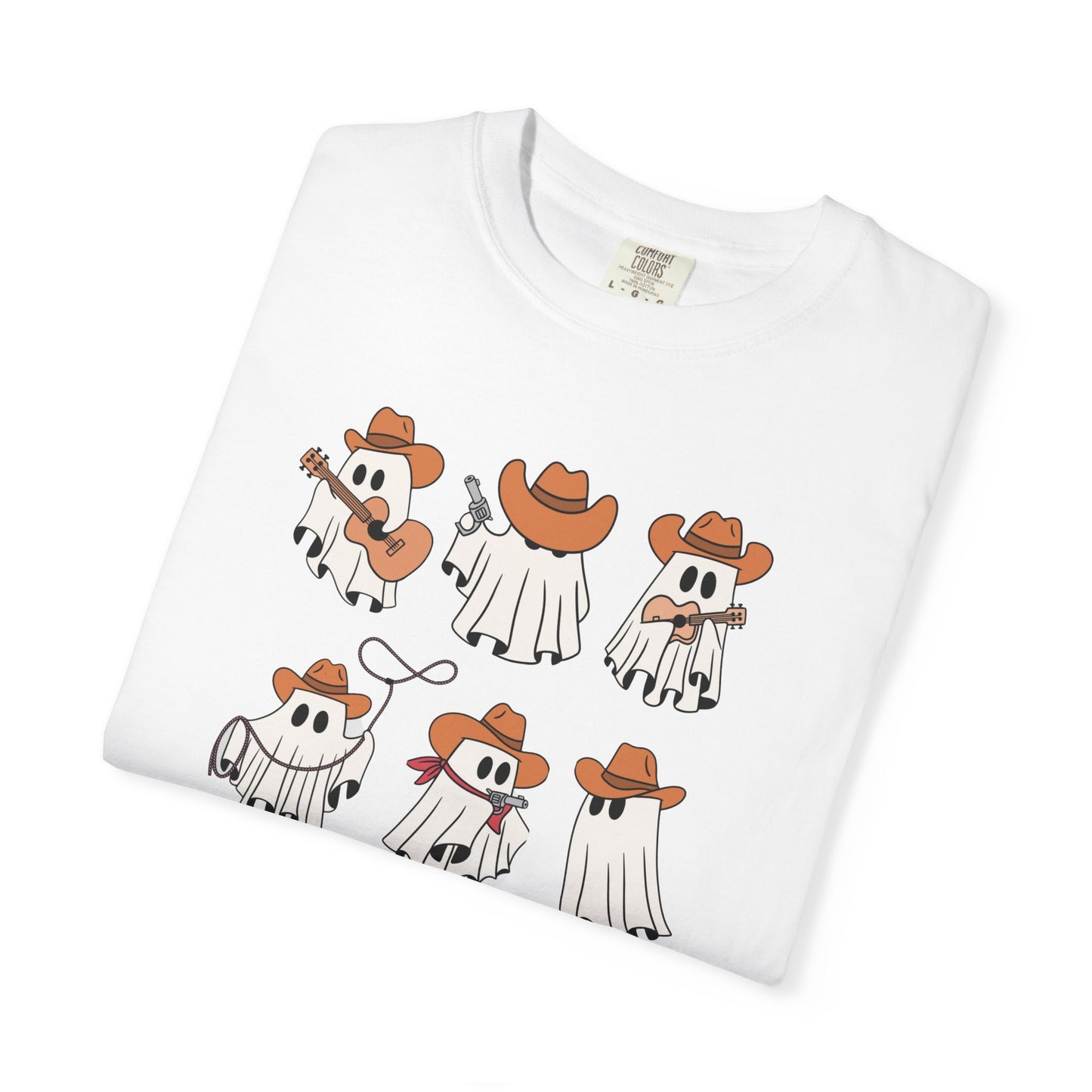 A folded white short-sleeve T-shirt on a white background, featuring a cartoon graphic of six ghosts wearing orange cowboy hats and playing musical instruments.