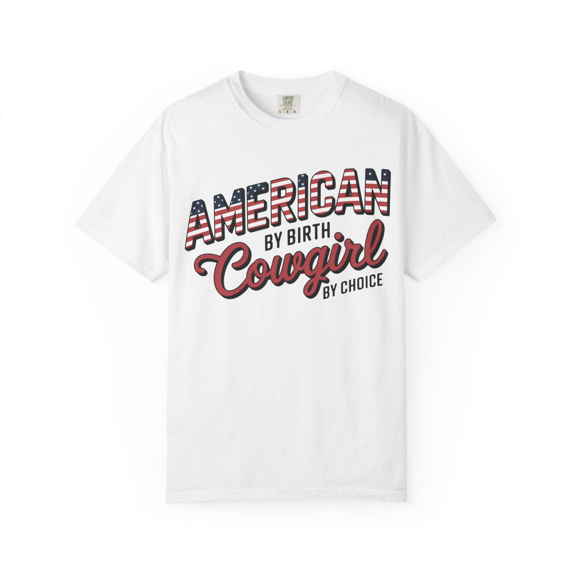 American by Birth Cowgirl by Choice tee with patriotic western lettering laid flat against white background