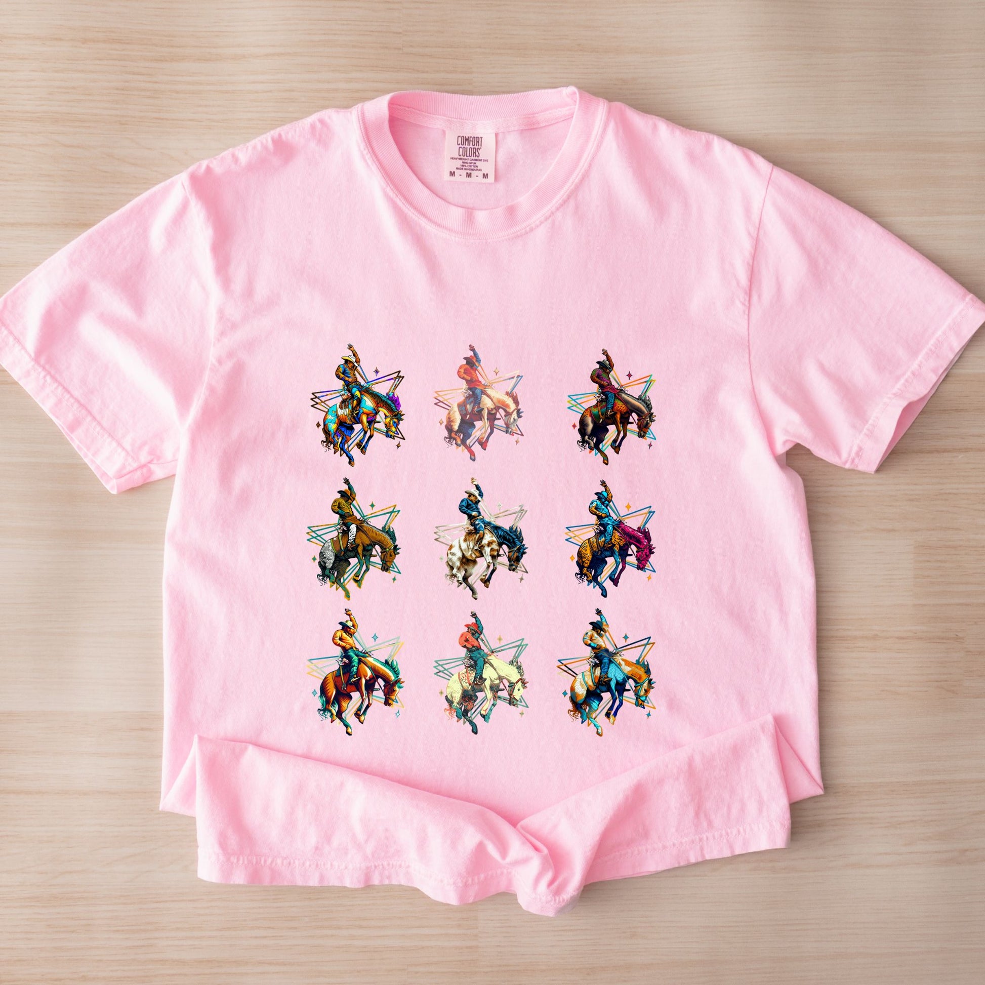 Bronc Grid Cowboy Tee laid flat in color blossom