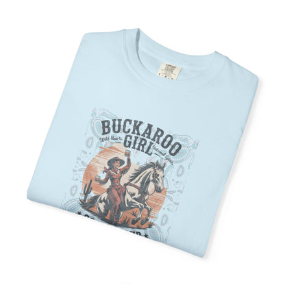Buckaroo Spirits tee with vintage cowgirl riding horse graphic and western paisley border folded in color chambray