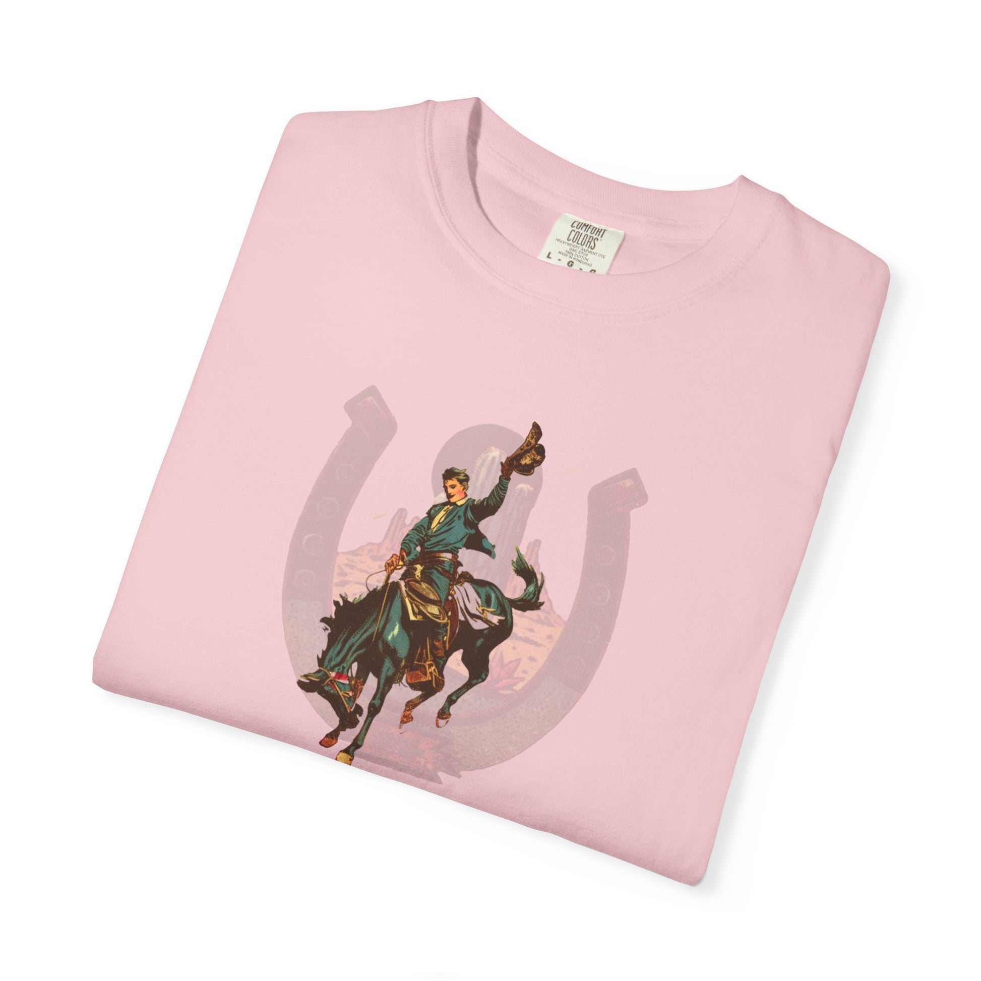 Buckaroo horseshoe tee with vintage bronc rider and desert cactus graphic folded on white background in blossom