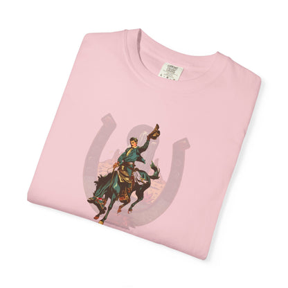 Buckaroo horseshoe tee with vintage bronc rider and desert cactus graphic folded on white background in blossom