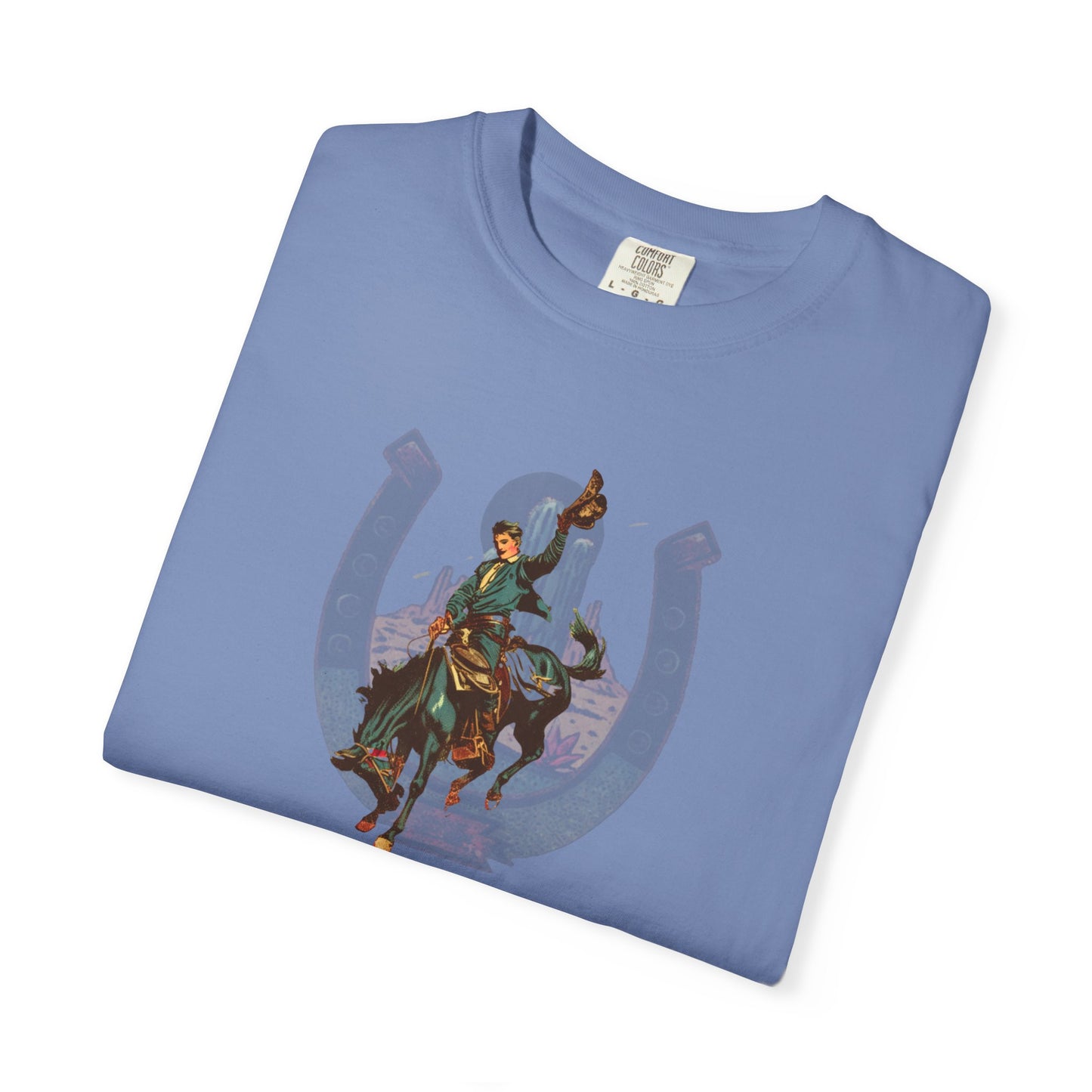 Buckaroo horseshoe tee with vintage bronc rider and desert cactus graphic folded on white background in washed denim