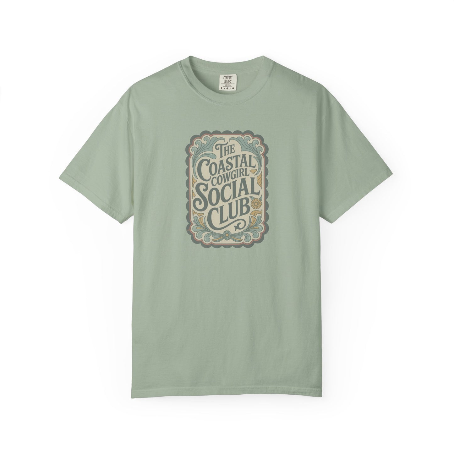 Coastal Cowgirl Clubhouse tee with vintage western sign print and retro coastal colours front view in color bay