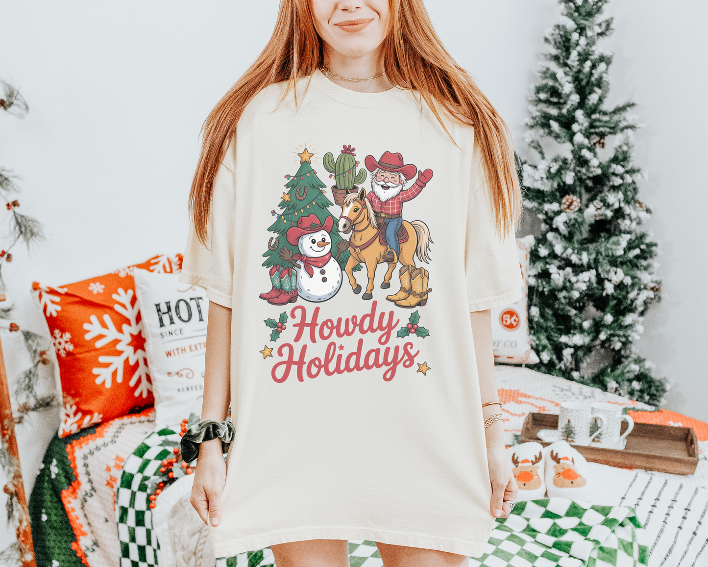 Howdy Holidays Comfort Colors Western Christmas t-shirt with cowboy Santa, horse, snowman, cactus, and Christmas tree graphic