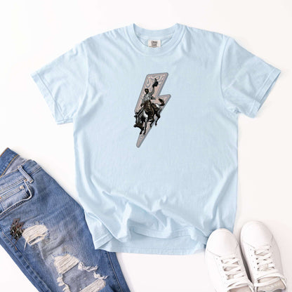 Lightning rider cowboy tee showing shirt in color chambray laying flat with jeans and shoes