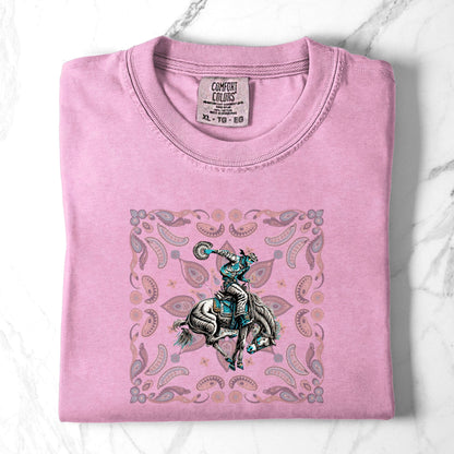 Paisley bronc rider western tee laid flat in color blossom