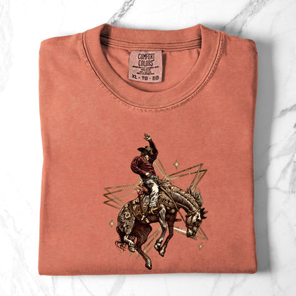 Rodeo Rebel Graphic Tee folded in color terracota