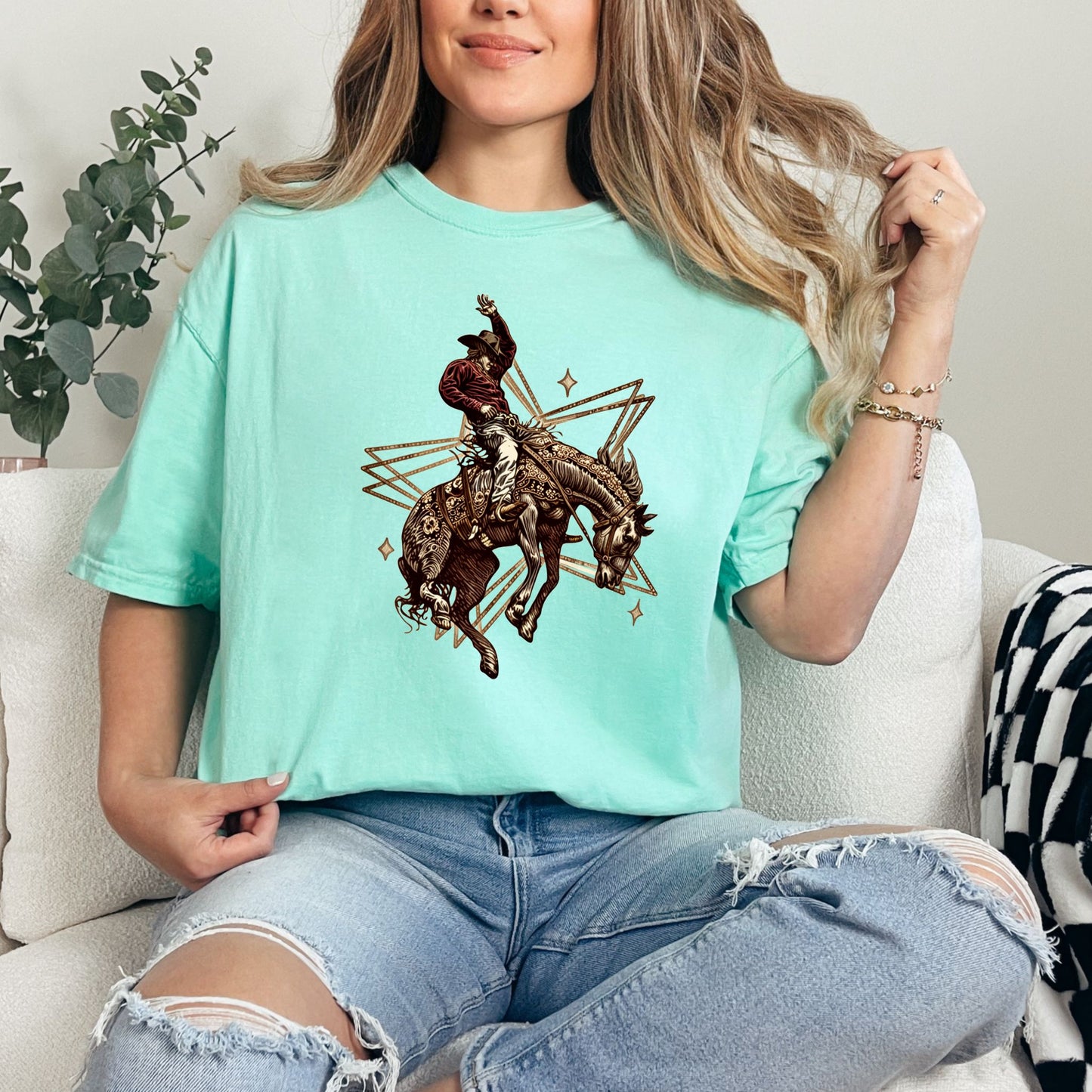 Rodeo Rebel Graphic Tee on model in color island reef