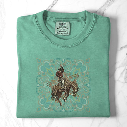 Rodeo spirit bronco tee folded in color island reef