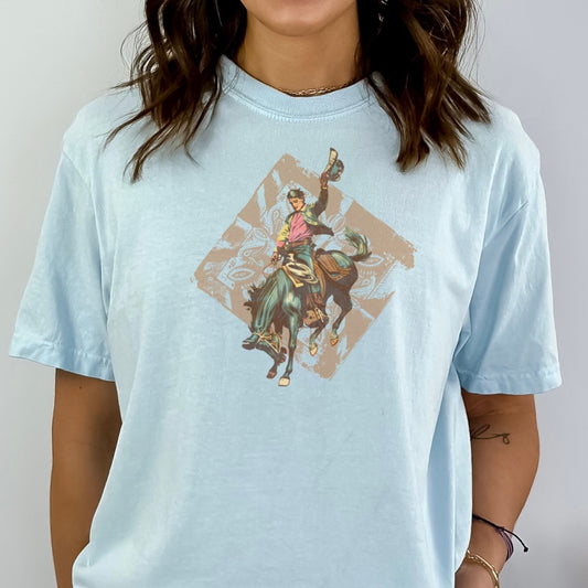 Rodeo spirit vintage bronc tee on model in color chambray