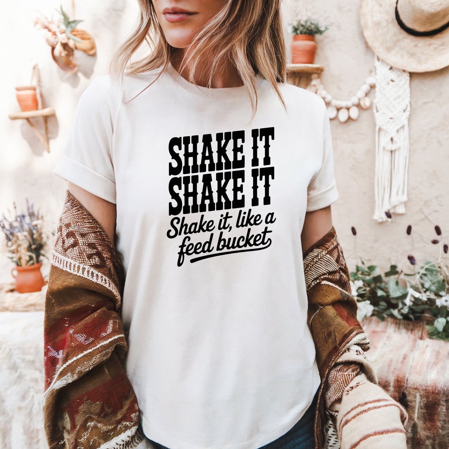 Shake It Like a Feed Bucket Comfort Colors equestrian graphic t-shirt with black Western lettering