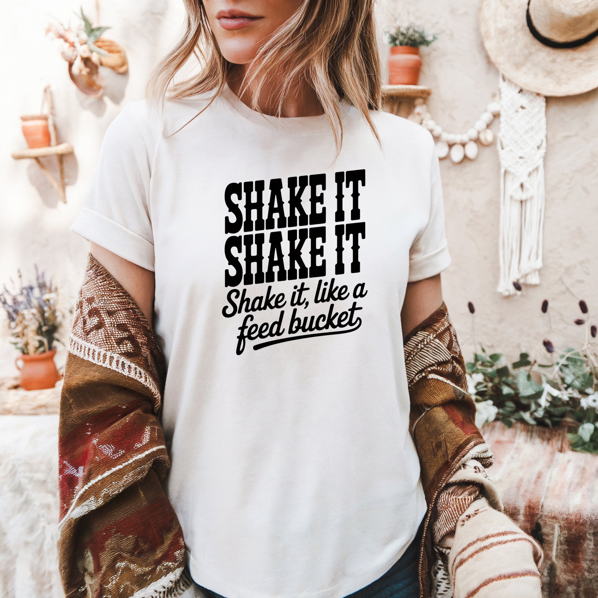 Shake It Like a Feed Bucket Comfort Colors equestrian graphic t-shirt with black Western lettering
