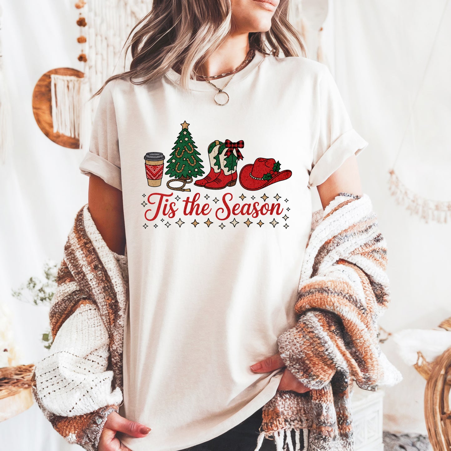 Western Tis the Season Comfort Colors Christmas t-shirt with coffee cup, Christmas tree, cowboy boot, wreath, and red cowboy hat graphic