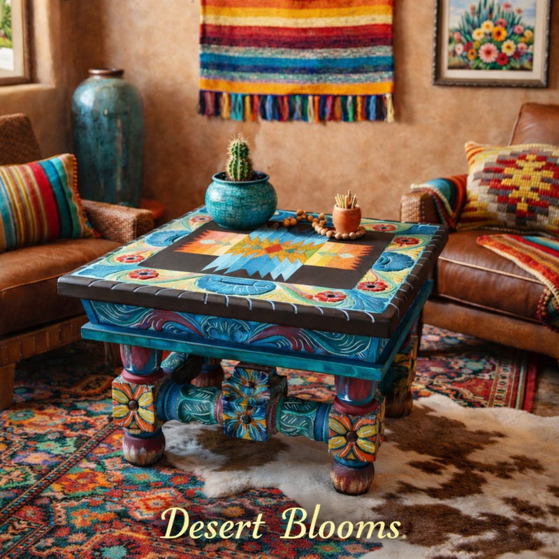 southwestern style hand painted table with 'Desert Blooms' text in a living room setting.